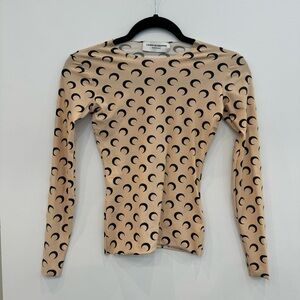 Nude and black Marine Serre White Line Iconics along Sleeve top